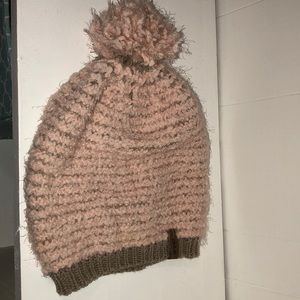 Pink and tan beanie with puff on top